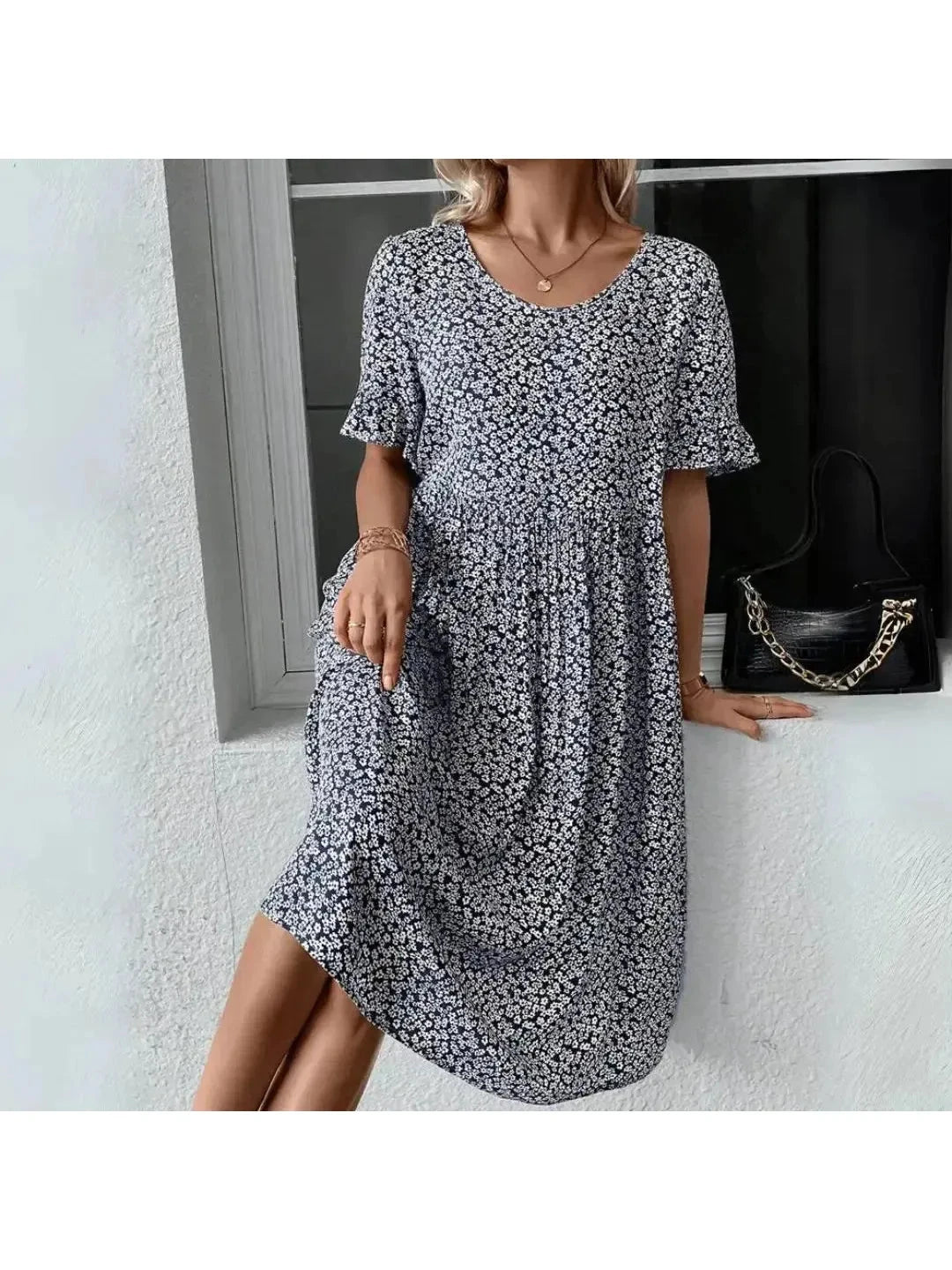 Blue floral printed casual dress by Lumina Vancouver, featuring a relaxed fit and stylish design.