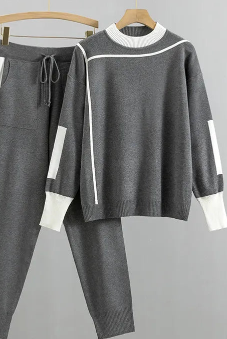 Red Kaitlyn Lumina Wear relaxed chic lounge set with modern accents, comfortable loungewear for stylish relaxation.