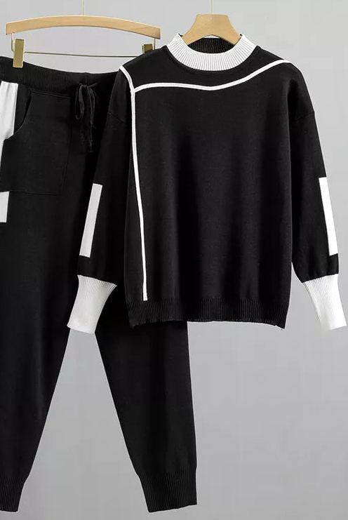 Red Kaitlyn Lumina Wear relaxed chic lounge set with modern accents, featuring comfortable loungewear style and stylish details.