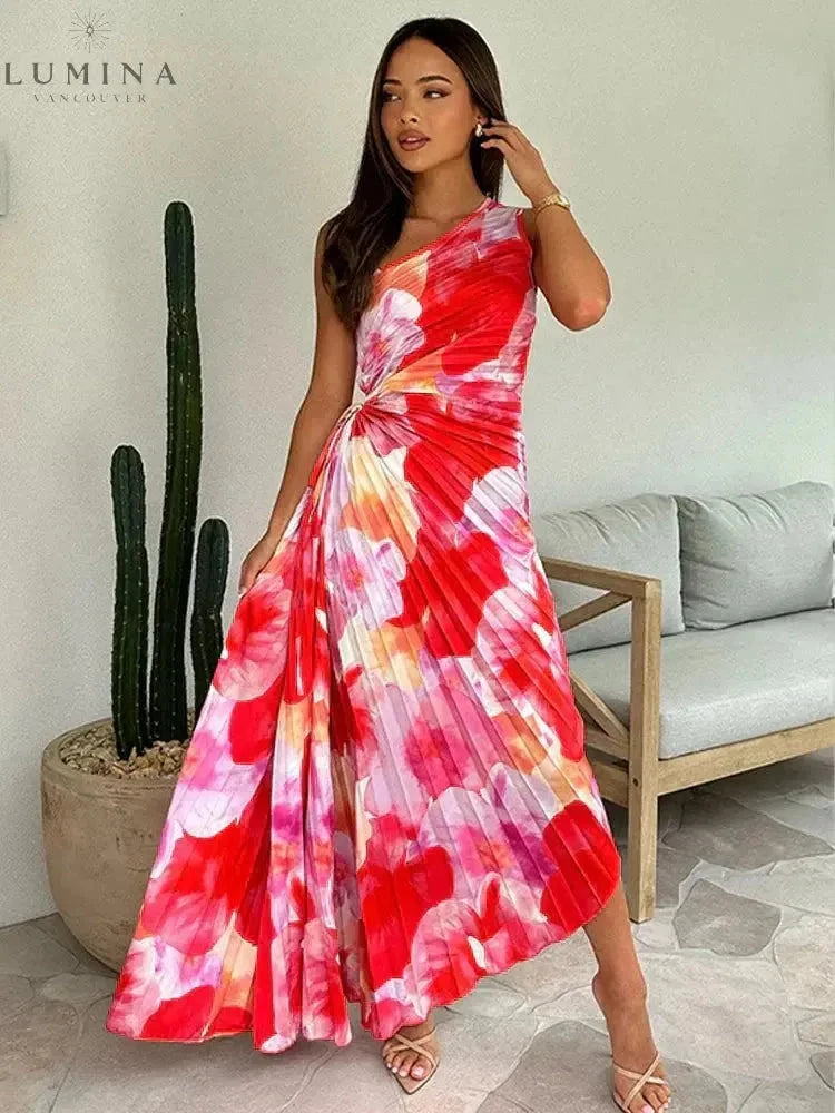 Pink and red Katie pleated summer wedding guest dress by Lumina Vancouver, featuring a stylish, flowy design perfect for warm occasions.