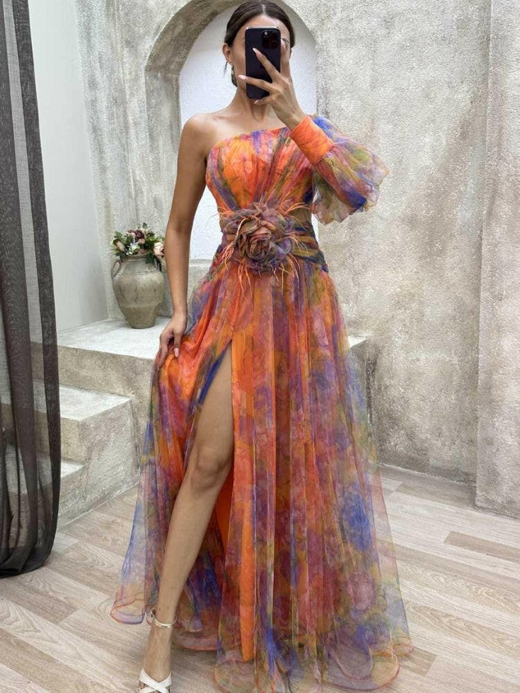 Purple KAYLA™ one-shoulder floral maxi dress by Lumina Vancouver, flowing fabric and elegant design for summer occasions.
