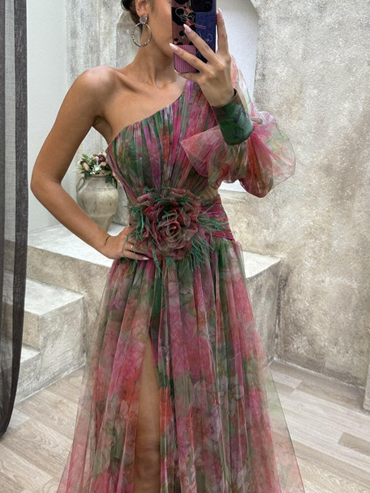 Purple KAYLA™ one-shoulder floral maxi dress by Lumina Vancouver, flowing fabric and elegant design for summer occasions.