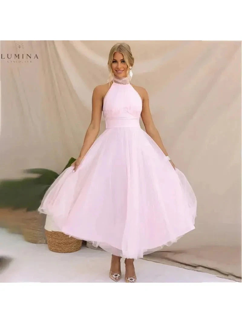 Kaylee fairy dress in crème for wedding guests, by Lumina Vancouver, featuring a delicate, flowing design perfect for special occasions.