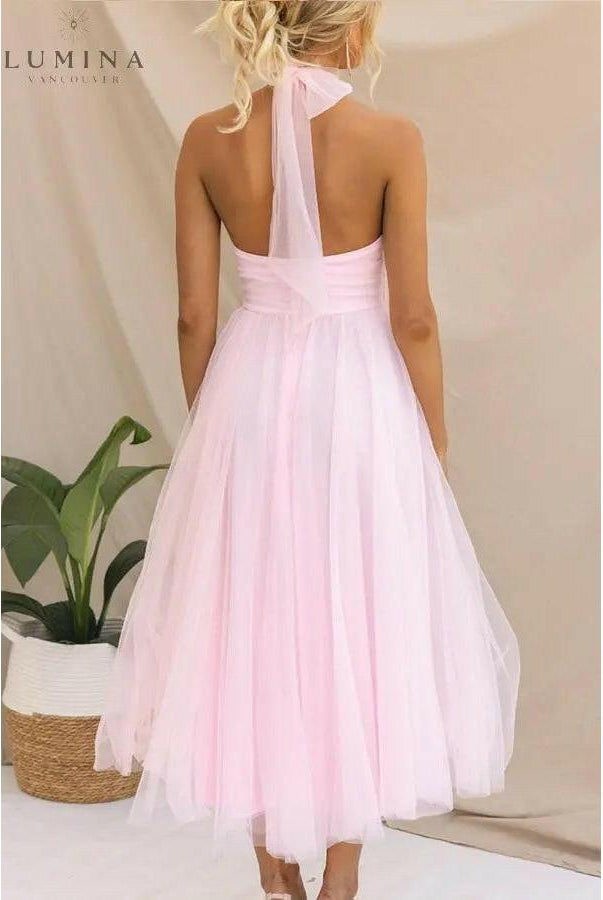Cream-colored Kaylee fairy evening dress by Lumina Wear, featuring delicate details, perfect for wedding guests or special occasions.