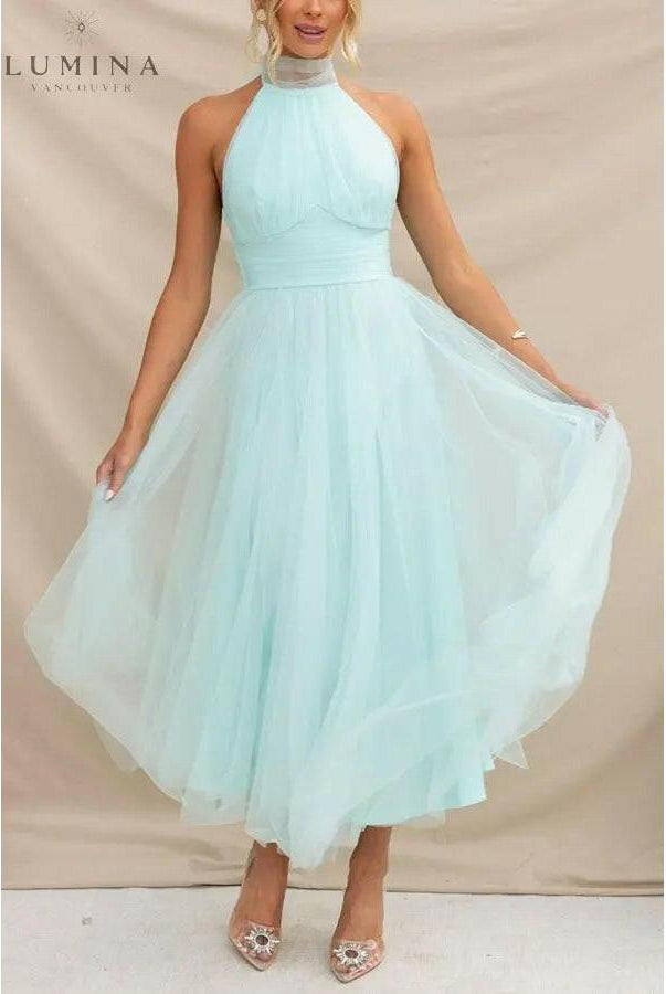 Cream fairy evening dress by Lumina Wear featuring delicate embellishments, perfect for wedding guests and special occasions.