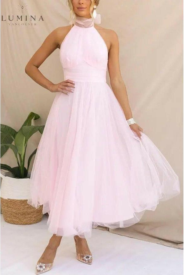 Kaylee fairy evening dress in creme by Lumina Wear, featuring elegant design perfect for wedding guests or special occasions.