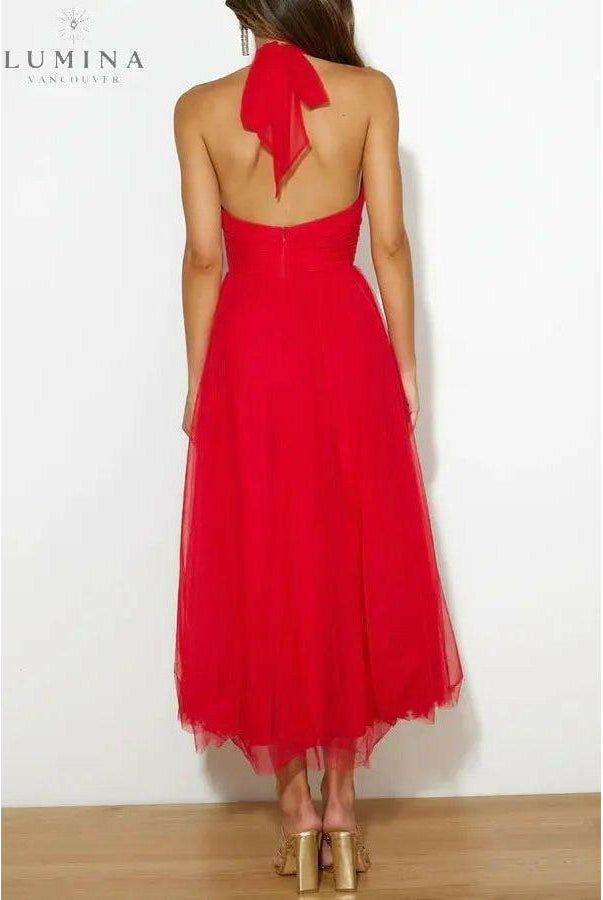 Kaylee fairy evening dress in crème by Lumina Wear, featuring flowing fabric and elegant design for special occasions.
