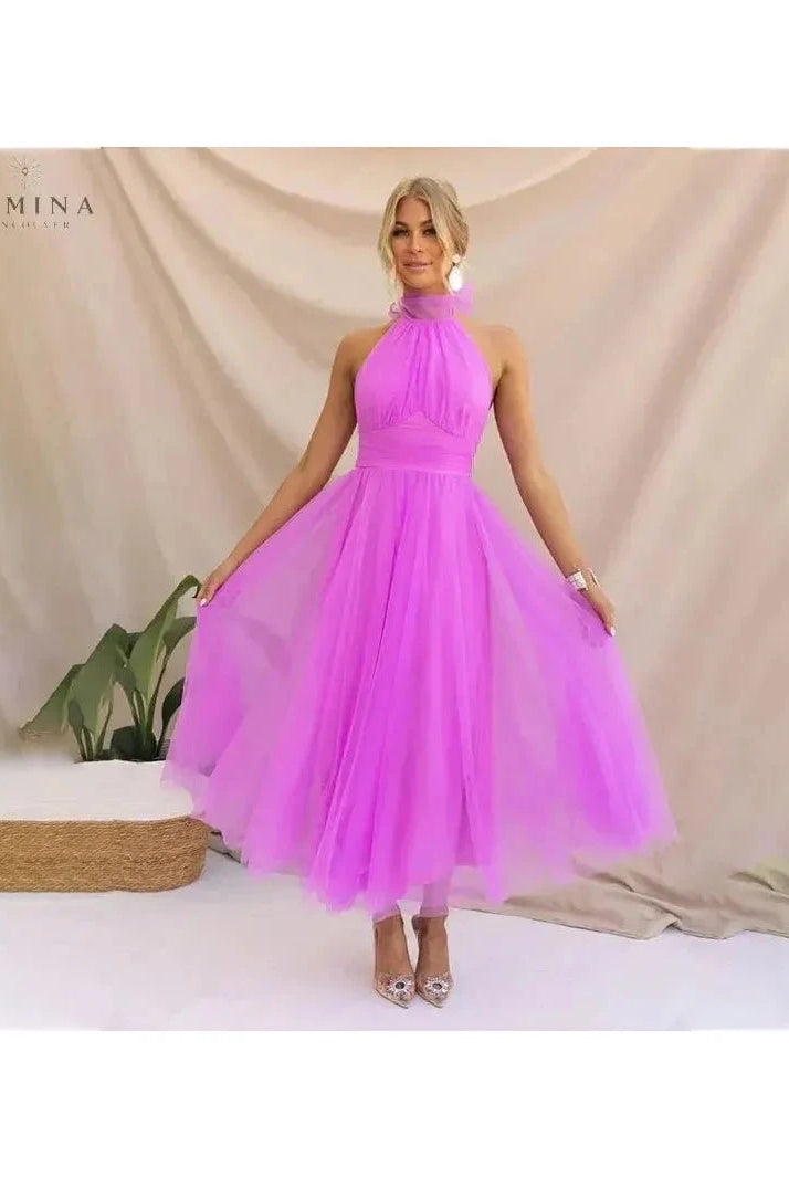 Cream-colored Kaylee Fairy Evening Dress by Lumina Wear featuring delicate fairy-inspired design, perfect for wedding guests and special occasions.
