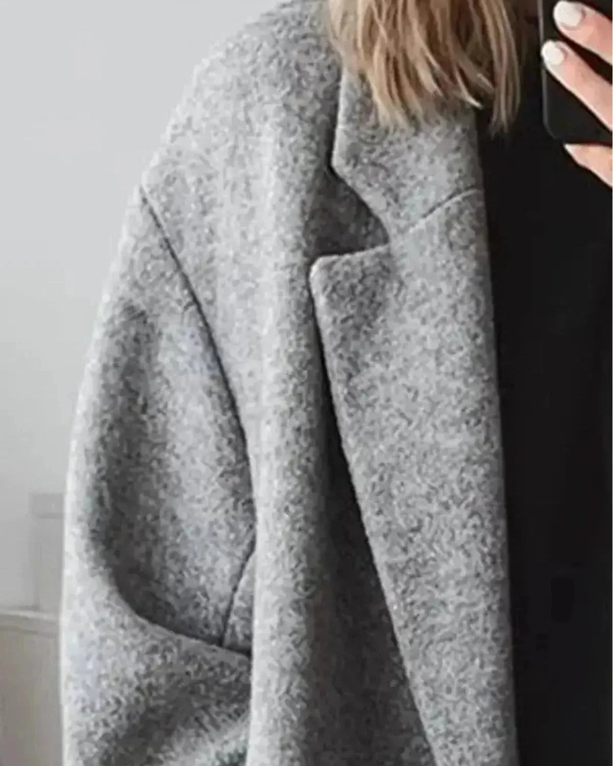 Gray Kelly women's winter long coat by Lumina Wear, stylish and warm, shown on a model in a winter outdoor setting.