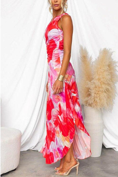 Red Kelsey pleated summer dress by Lumina Wear, shown on a model, perfect for warm-weather events and casual outings.