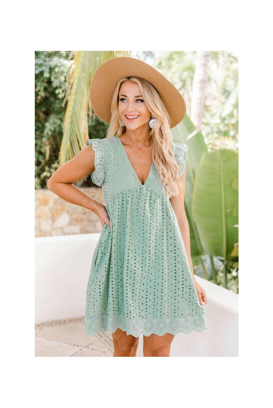 Black Kenna Breezy Summer Dress by Lumina Wear, lightweight and stylish for warm weather, shown on a model.