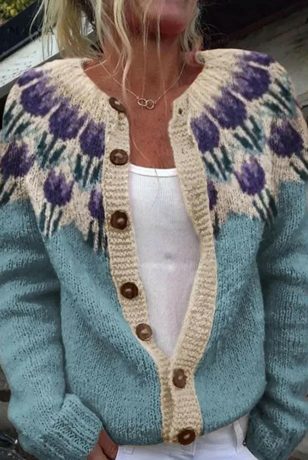 Light blue Keysha cardigan with floral pattern by Lumina Wear, showcasing its soft knit fabric and intricate floral design.