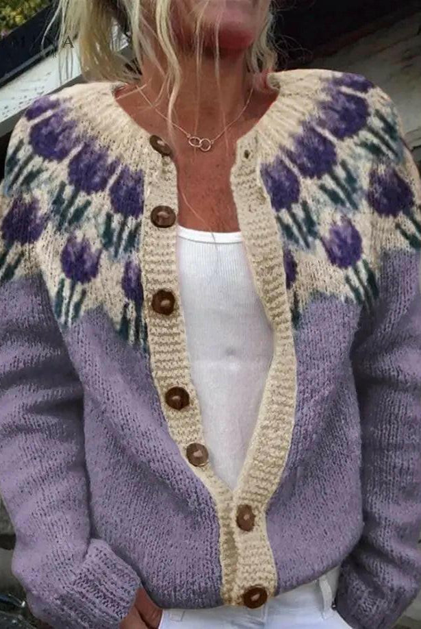 Light blue Keysha cardigan with floral pattern from Lumina Wear, shown on a model, styled for a casual look.