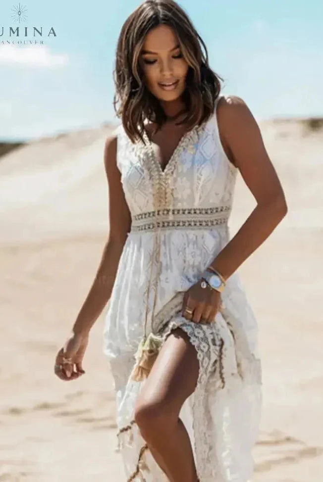 Beige Manon elegant boho dress by Lumina Wear, featuring flowing fabric and stylish design, perfect for holiday vibes.