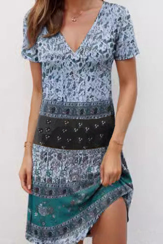 Green Kira mini dress by Lumina Vancouver featuring a relaxed patchwork boho style, perfect for casual summer wear.