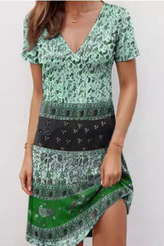 Green Kira mini dress by Lumina Vancouver featuring relaxed fit and boho patchwork design.