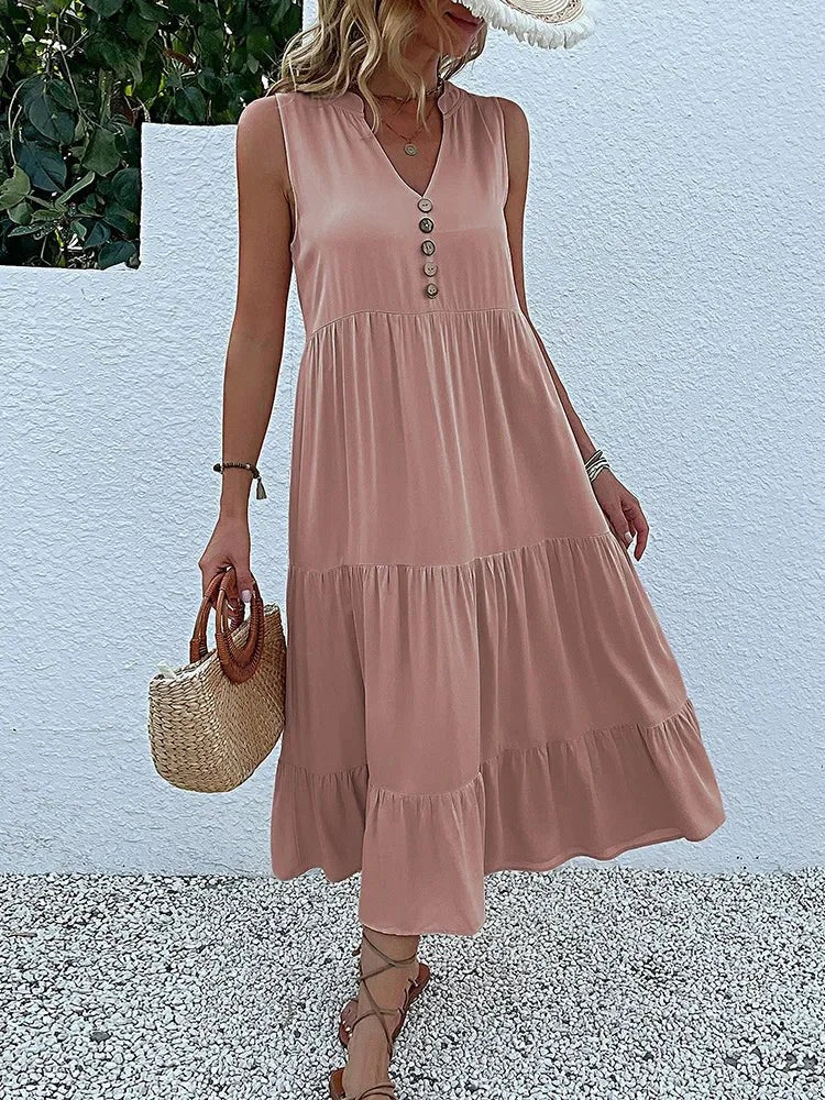 Wine red Laiza™ elegant summer dress by Lumina Vancouver, displayed on a hanger with floral background.