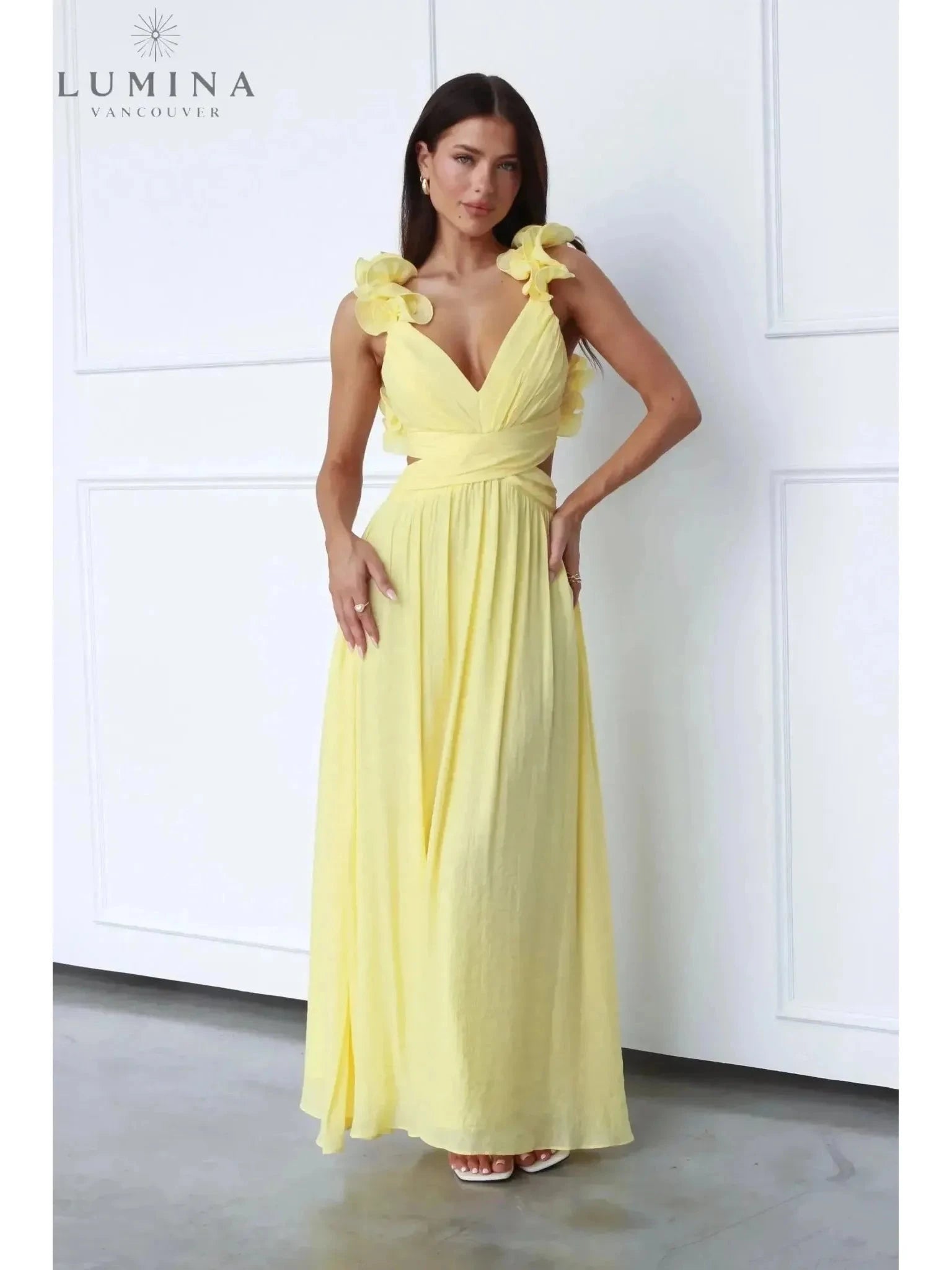 Lanae elegant wedding guest dress by Lumina Vancouver featuring a deep V-neck, fitted silhouette, and sophisticated style.
