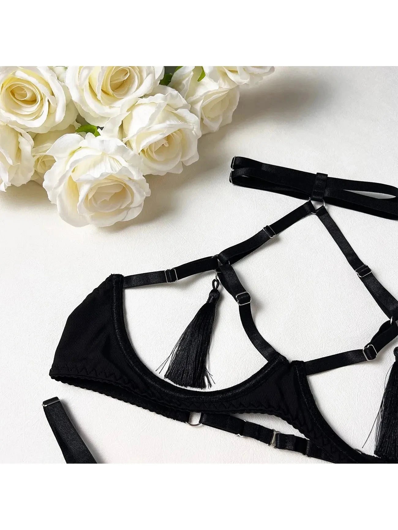 Black Layla tassle lingerie set by Lumina Vancouver featuring delicate lace details and stylish tassel accents, size small to large