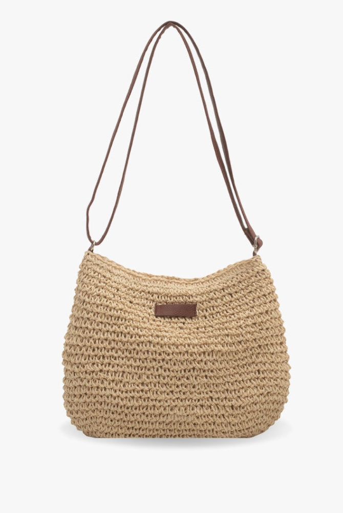 Chic beige straw shoulder bag by Lumina Wear with vegan leather accents and a stylish, compact design.