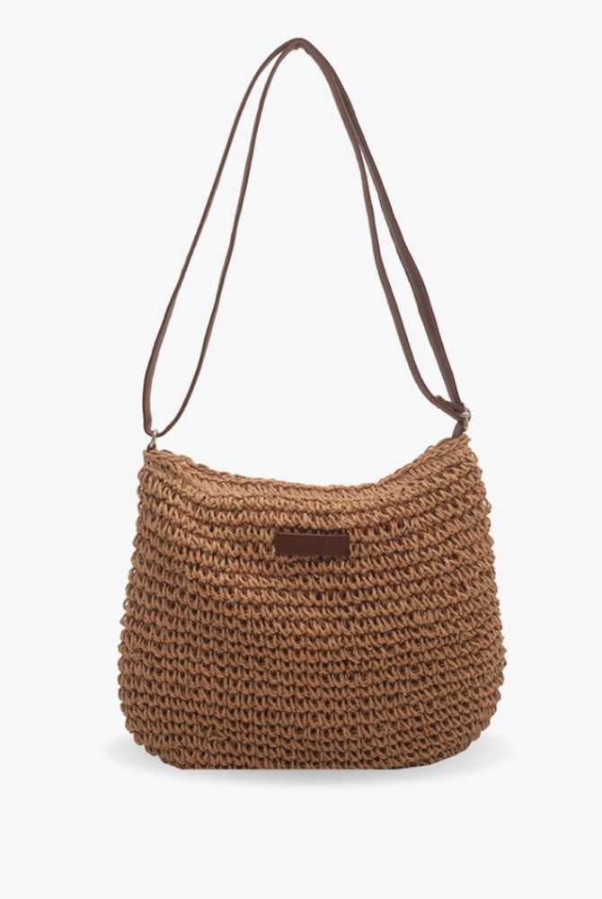 Chic beige straw shoulder bag by Lumina Wear featuring vegan leather accents and a stylish design.