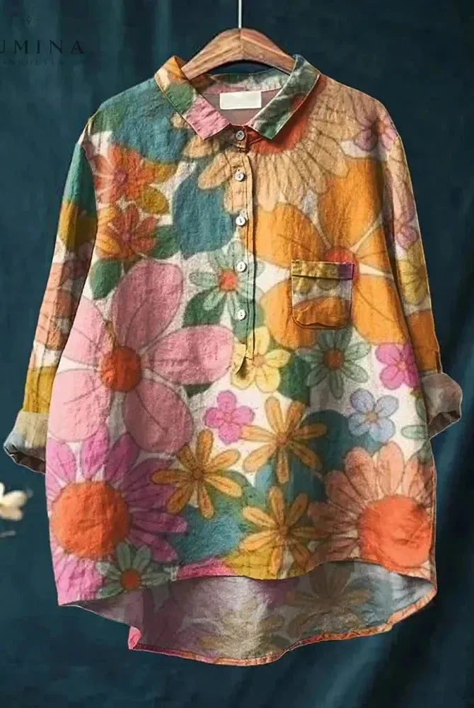 Orange and pink flower print blouse by Lumina Wear, Leila shirt with long sleeves and relaxed fit, stylish floral design.