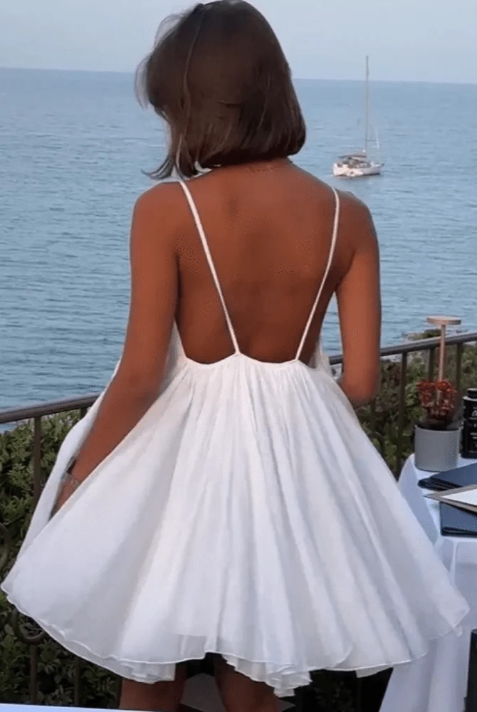 Lumina Wear Lena elegant dress in a stylish design, showcased on a model, perfect for sophisticated occasions.