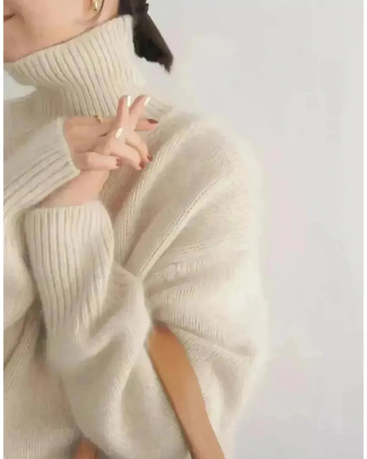 Beige Lena turtleneck sweater by Lumina Wear, featuring a cozy fit and classic style, displayed on a neutral background.