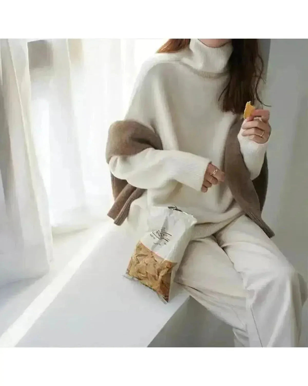Beige Lena turtleneck sweater by Lumina Wear featuring a cozy, fitted knit design, displayed on a neutral background.