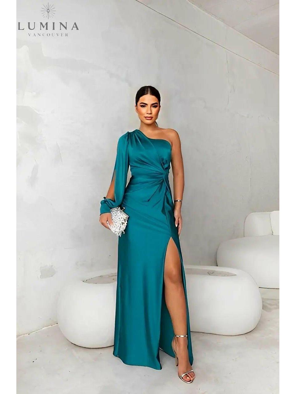Blue-green Lenoir elegant wedding guest dress by Lumina Wear, stylish sleeveless dress perfect for special occasions.