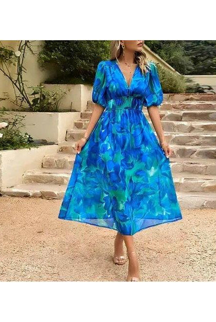 Blue Leona elegant midi evening dress by Lumina Wear, suitable for wedding guests, featuring a flattering fitted silhouette.