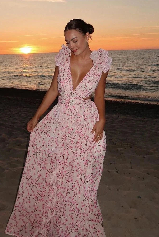 Light pink Lexi backless ruffles maxi dress by Lumina Wear, elegant floor-length dress with flowing ruffles and open back detail.