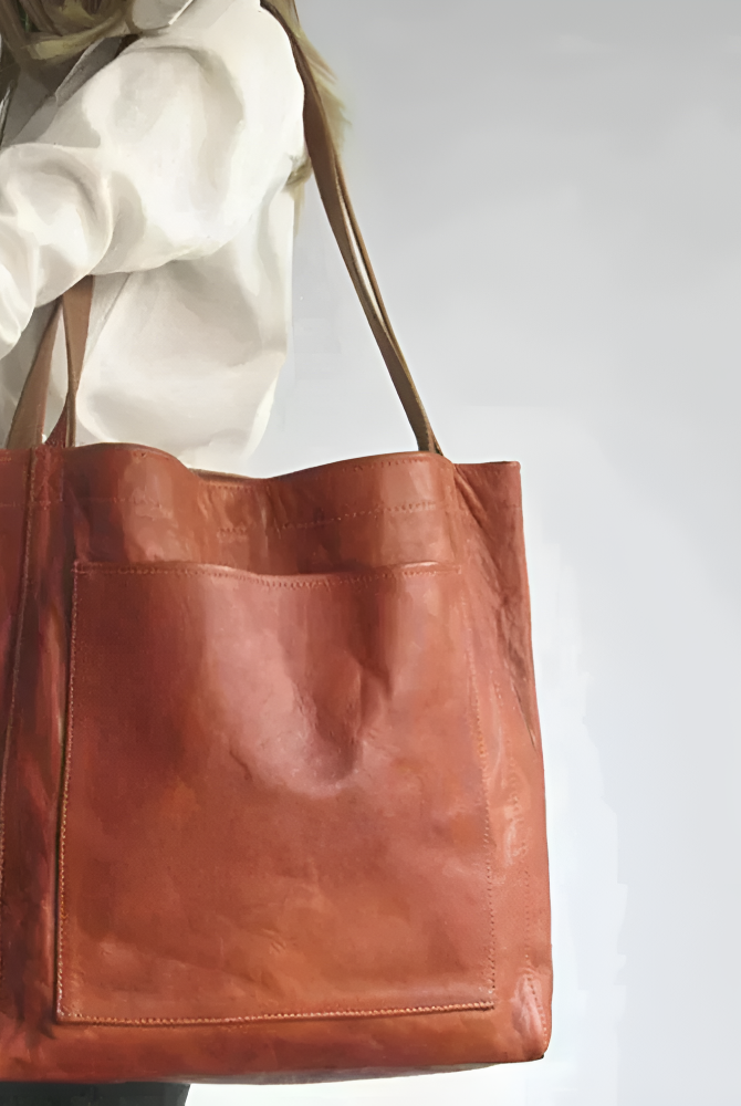 Lila Lumina Wear city handbag in chestnut brown with smart storage, versatile design, elegant look, and stylish handles.
