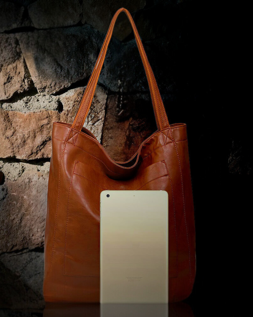 Lila Lumina city handbag in chestnut brown with smart storage compartments, versatile and elegant for everyday use.