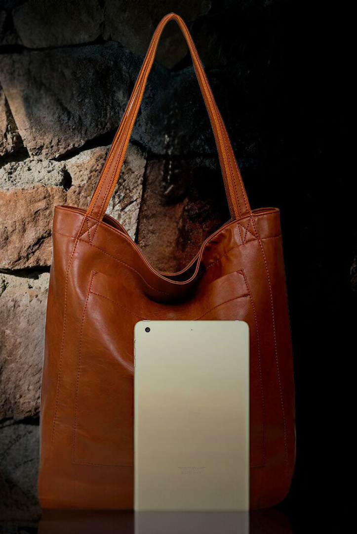 Lila Lumina Wear city handbag in chestnut brown with smart storage, versatile design, and elegant style.