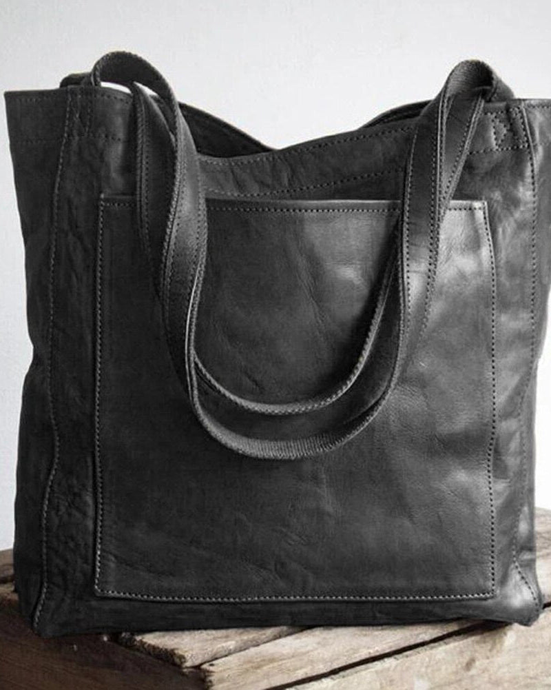 Lila Lumina Wear city handbag in chestnut brown with smart storage, versatile design, and elegant style.