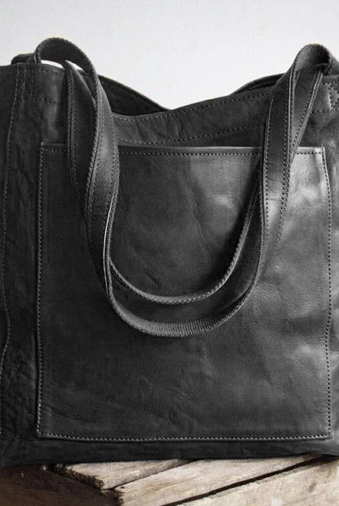 Lila Lumina Wear city handbag in chestnut brown with smart storage, elegant versatile design, suitable for everyday use.