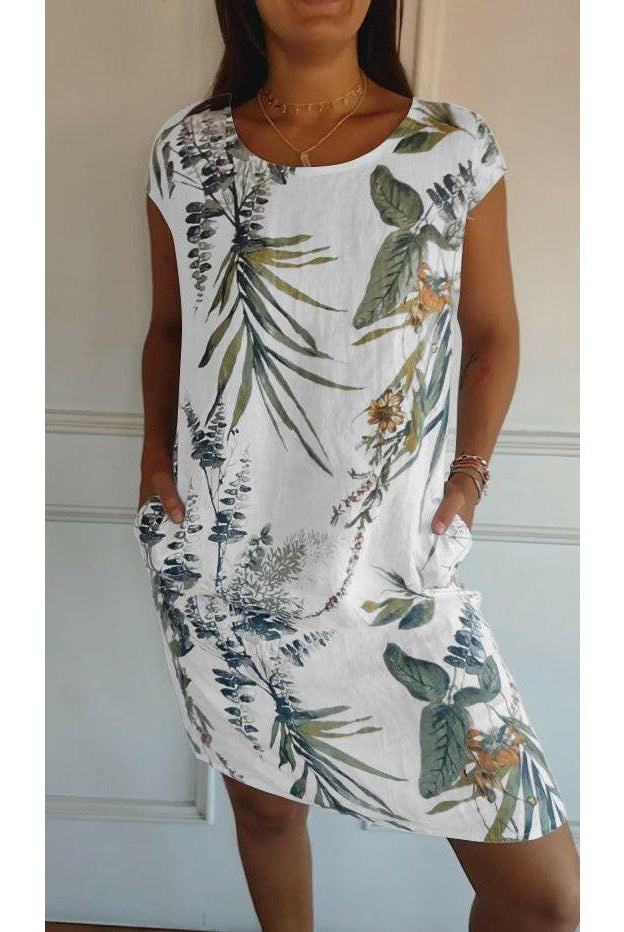 Lillian casual printed dress by Lumina Wear in white, displayed on a model, showcasing a relaxed, stylish design.