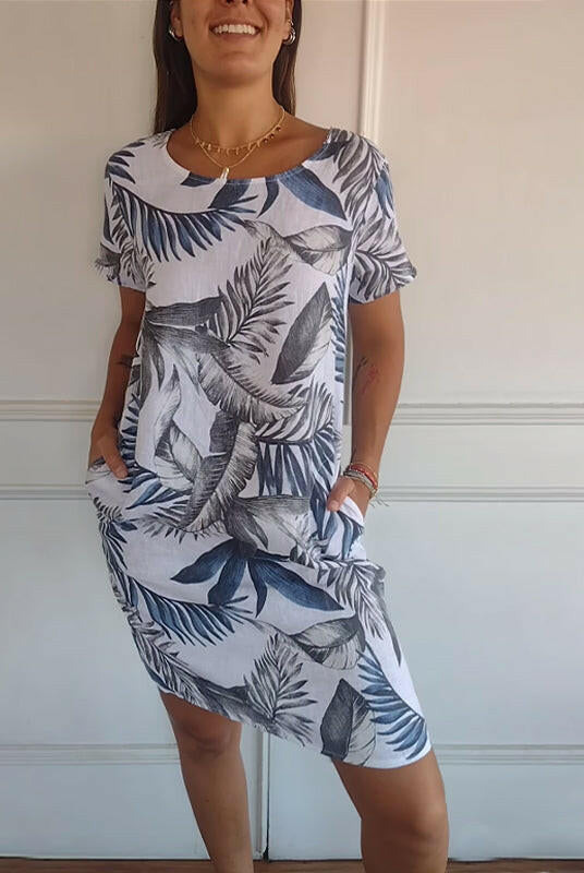 Lumina Wear Lillian casual printed dress in white, featuring a relaxed fit and floral pattern, perfect for everyday wear.