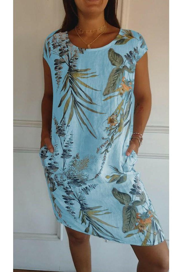 Lumina Wear Lillian casual printed dress in white, featuring a relaxed fit and floral pattern, perfect for everyday wear.
