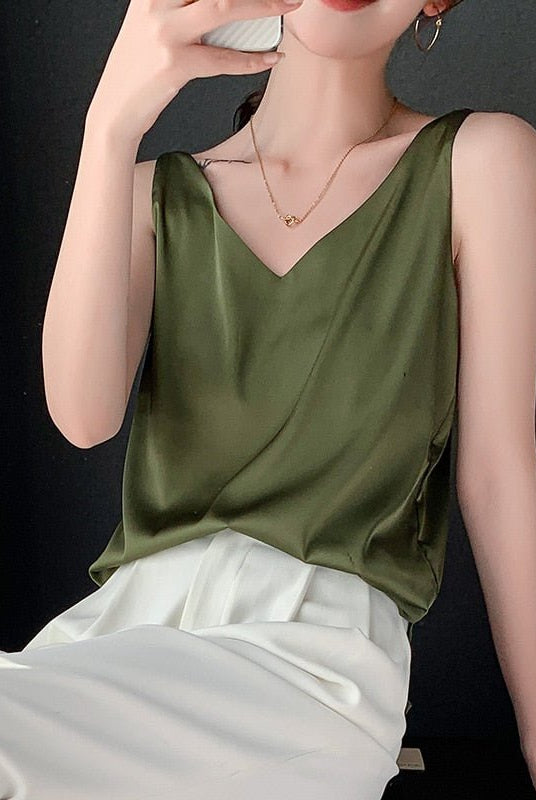 Black satin tank top by Lumina Wear featuring a relaxed fit and V-neck design, ideal for comfortable, stylish casual wear.