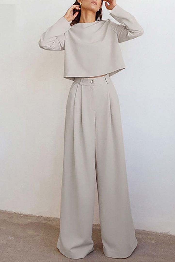 Black Lily two-piece set by Lumina Wear featuring a contemporary cropped top and wide-leg trousers.