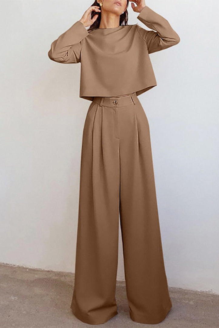 Black Lily two-piece set by Lumina Wear featuring a contemporary cropped top and wide-leg trousers.