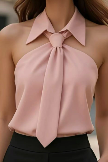 White Lily halter blouse with contrast details from Lumina Vancouver, shown on a mannequin in size XS.