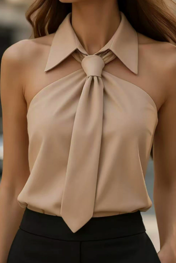 White Lily halter blouse with contrast details by Lumina Vancouver, shown on a mannequin. Perfect for casual or semi-formal wear.