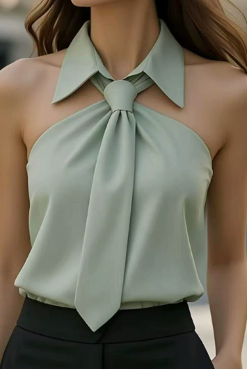 White Lily halter blouse with contrast details by Lumina Vancouver, shown on a mannequin.