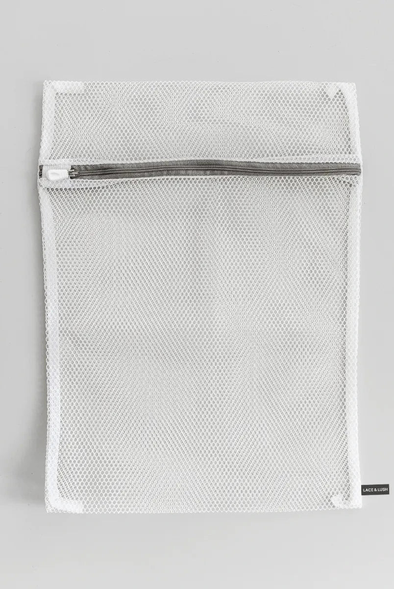 Lumina Wear lingerie care bag for delicate lingerie, with a mesh design for gentle washing and protection of intimate garments.
