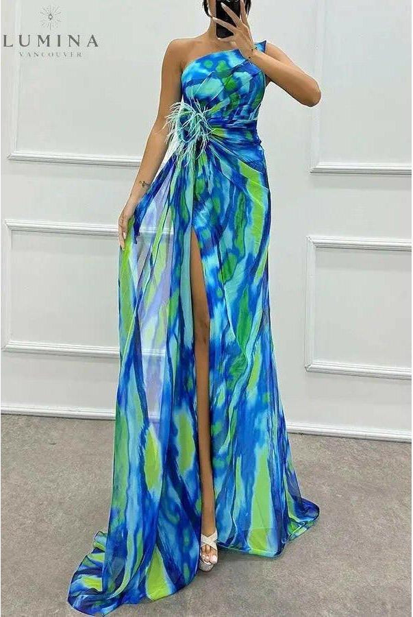 Blue Blanche off-shoulder slit printed maxi dress by Lumina Wear, perfect for wedding guests with elegant flowing fabric.