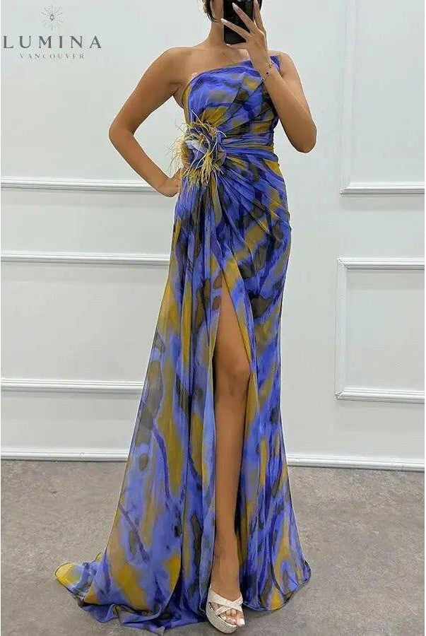 Blue Blanche off-shoulder slit printed maxi dress by Lumina Wear, perfect for wedding guests, with a flowing silhouette and elegant design.