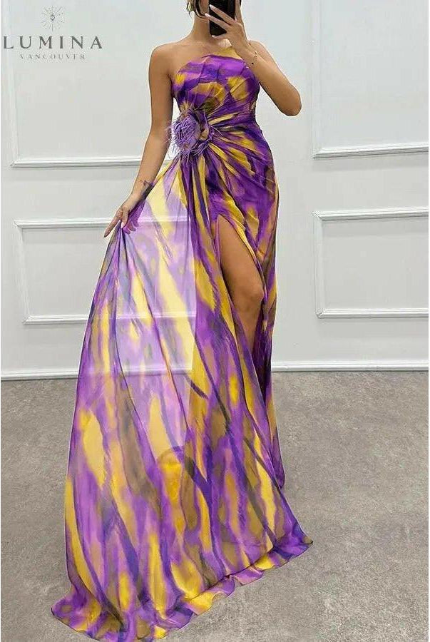 Blue off-shoulder printed maxi dress with slit from Lumina Wear, perfect for wedding guests and elegant summer occasions.
